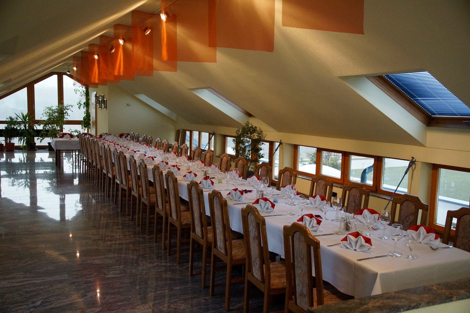Dining room at Restaurant Treno Orth an der Donau, set tables