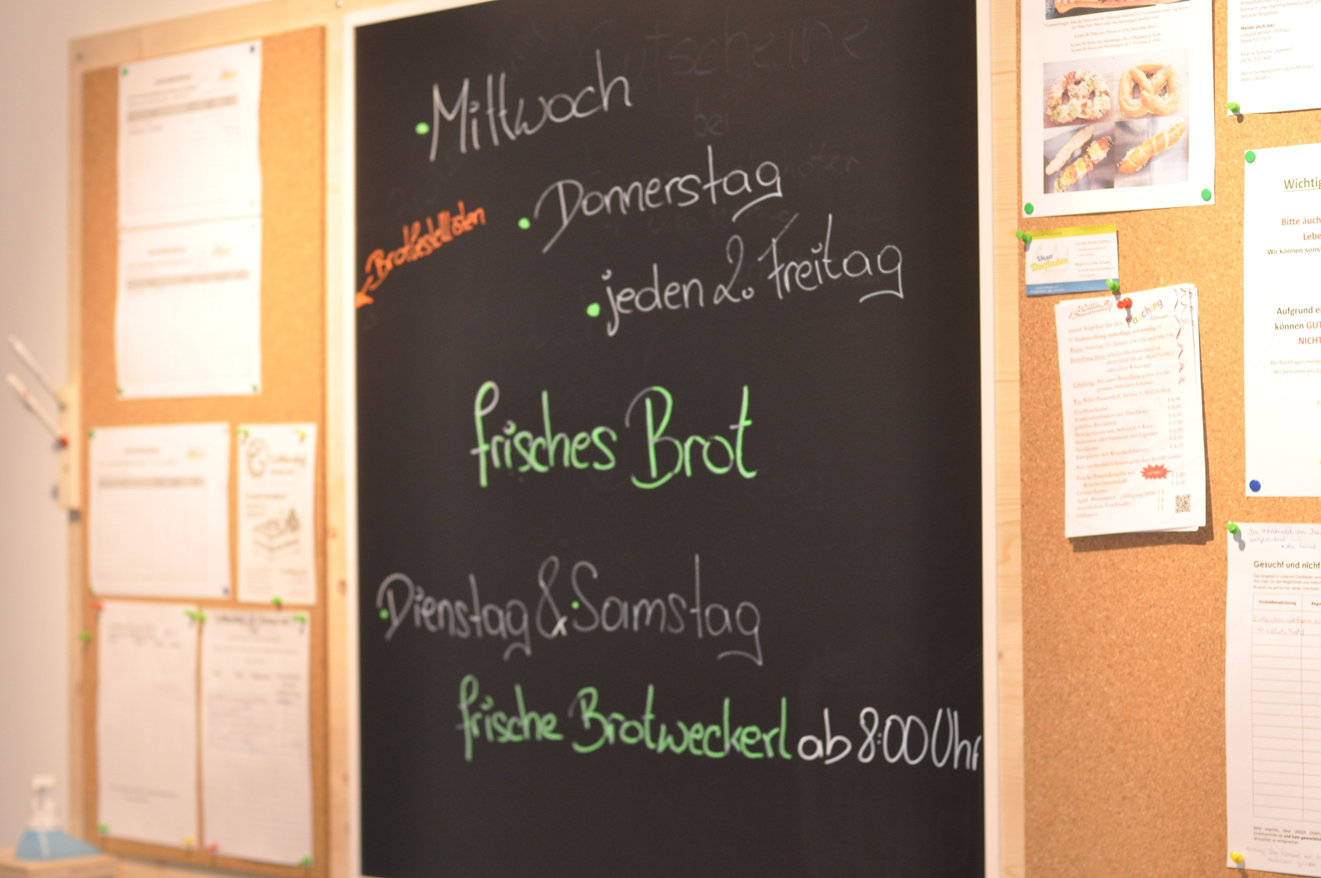 Information board in the entrance area of the village store