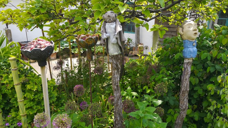 Garden with sculptures and plants