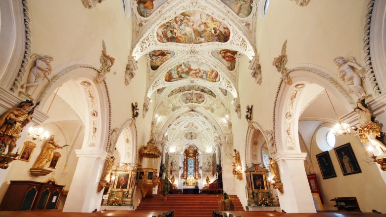 Interior view of Ardagger Abbey Church with its ornately painted ceiling and richly decorated walls.