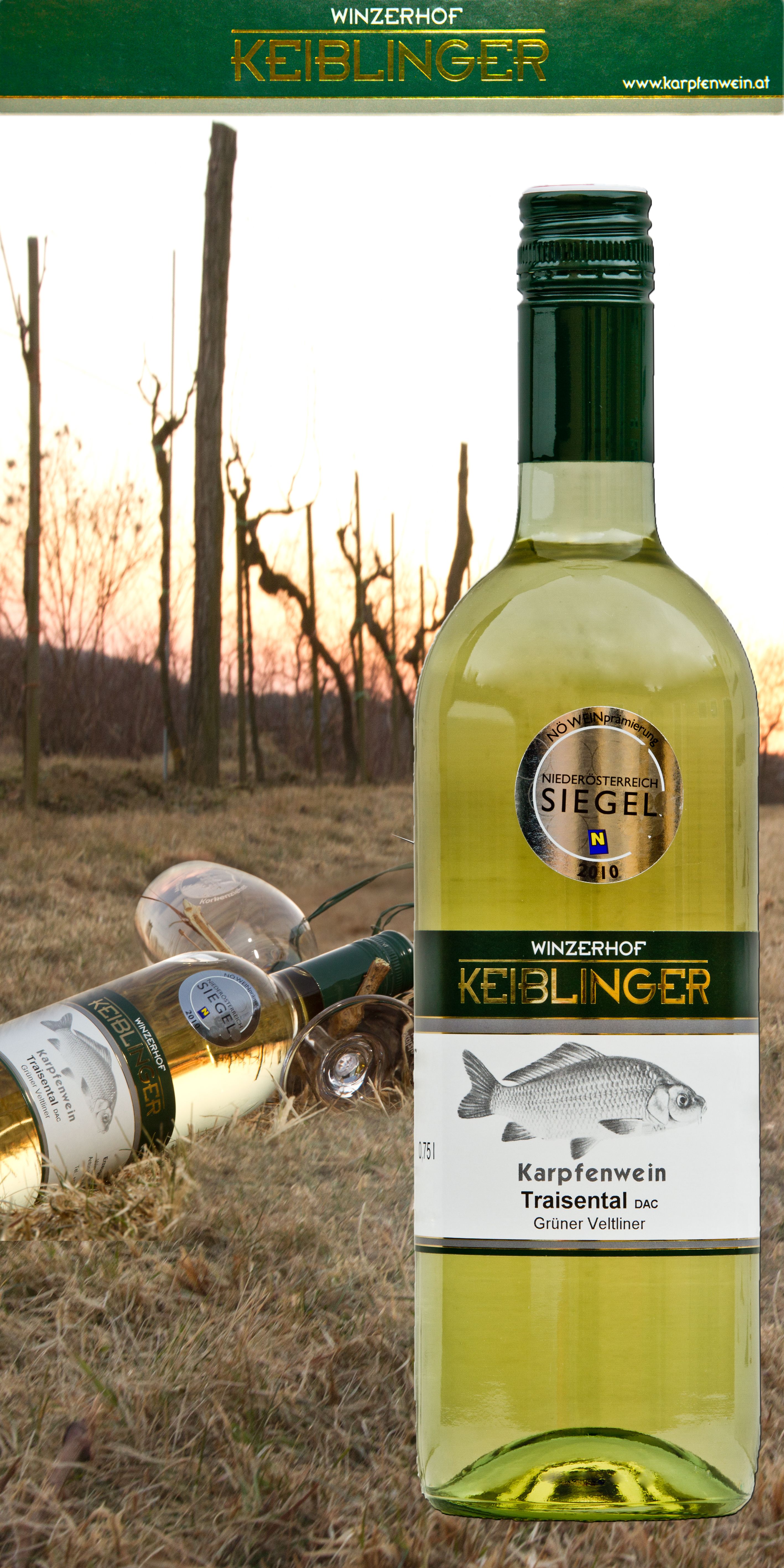 Keiblinger wine bottle in the foreground, vineyards in the background.