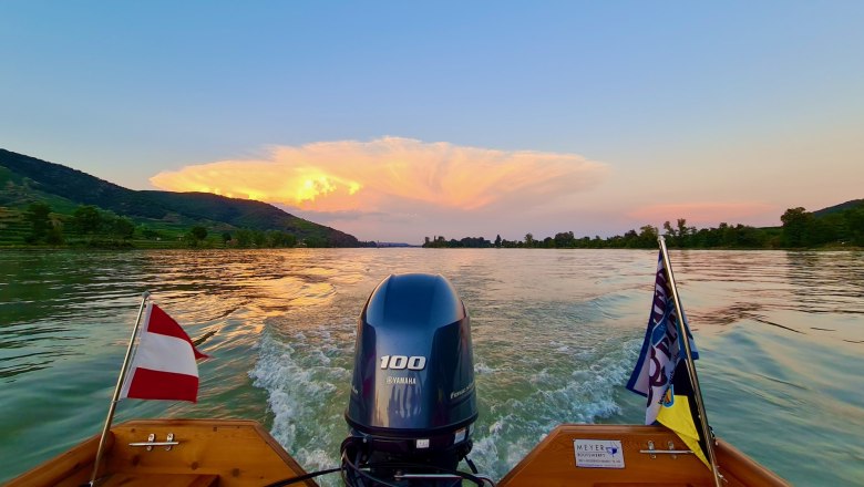 Boat trip on the Danube in the Wachau at sunset.