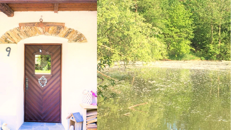 Front door of a cottage number 9 next to a pond with trees.