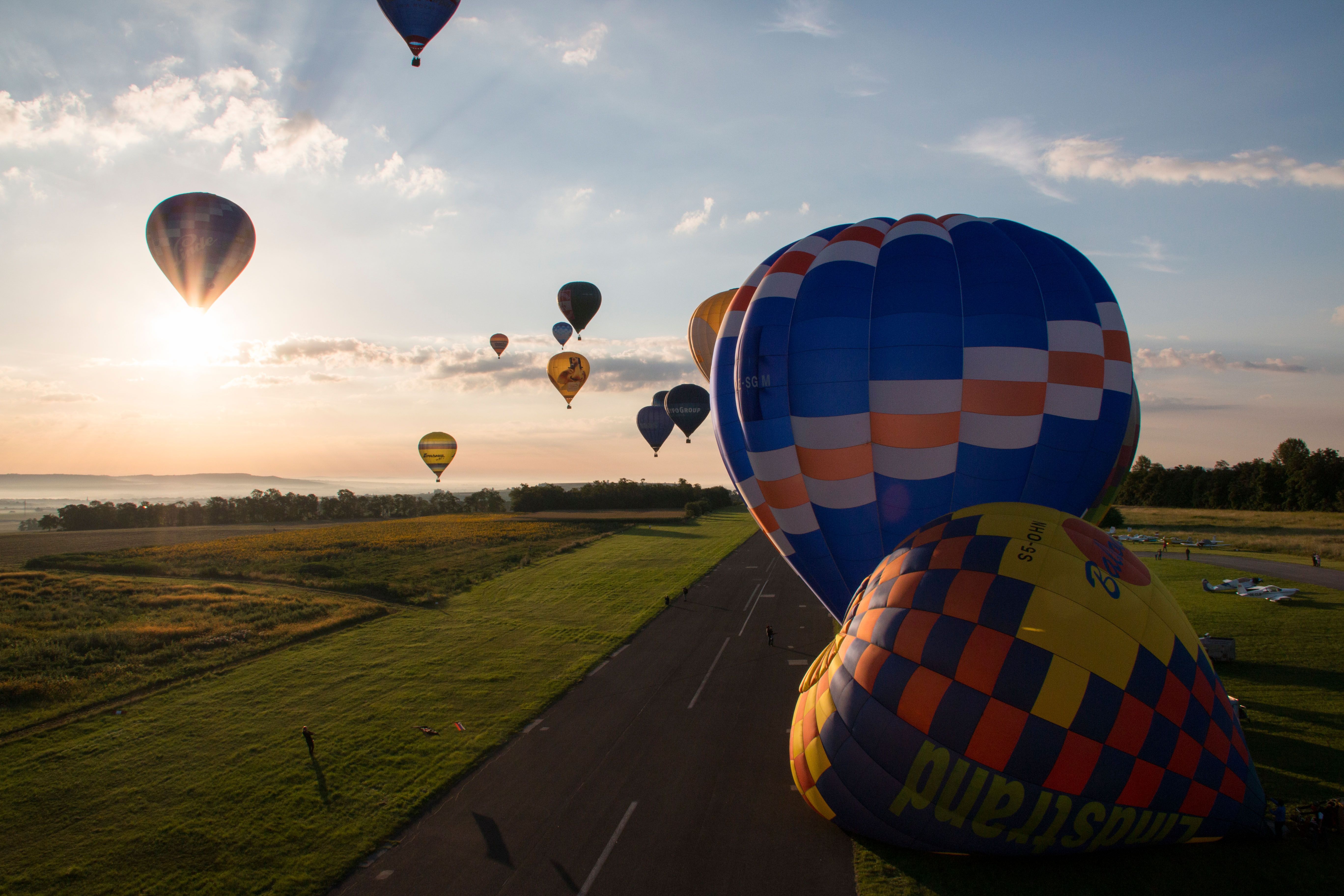 Hot air balloons take off from Krems-Gneixendorf Airport at sunrise.