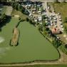 Aerial view of a bathing pond with campsite in Poysdorf.