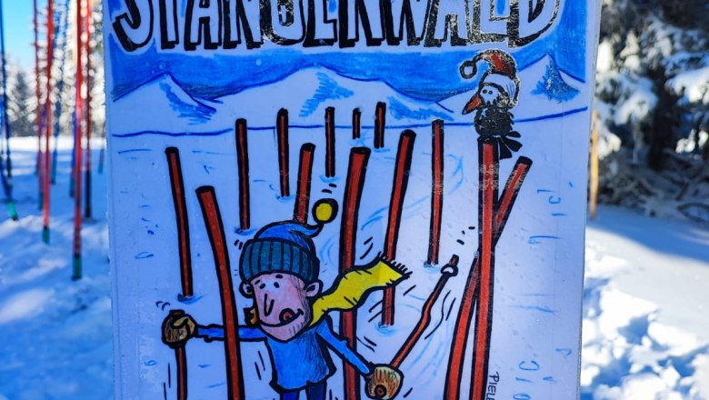 Sign in the snow with cartoon character on skis and text 'Stangenwald, find the fastest line'.