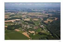 Aerial view of St. Pantaleon-Erla with fields and forests.