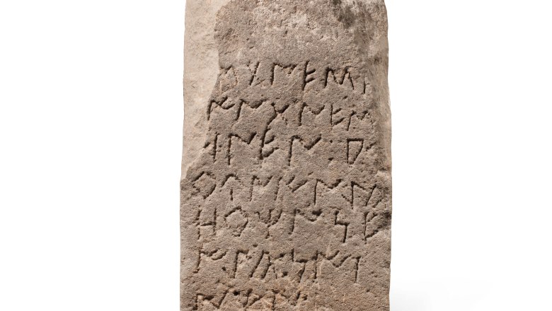 Iberian grave stele with sandstone inscription.