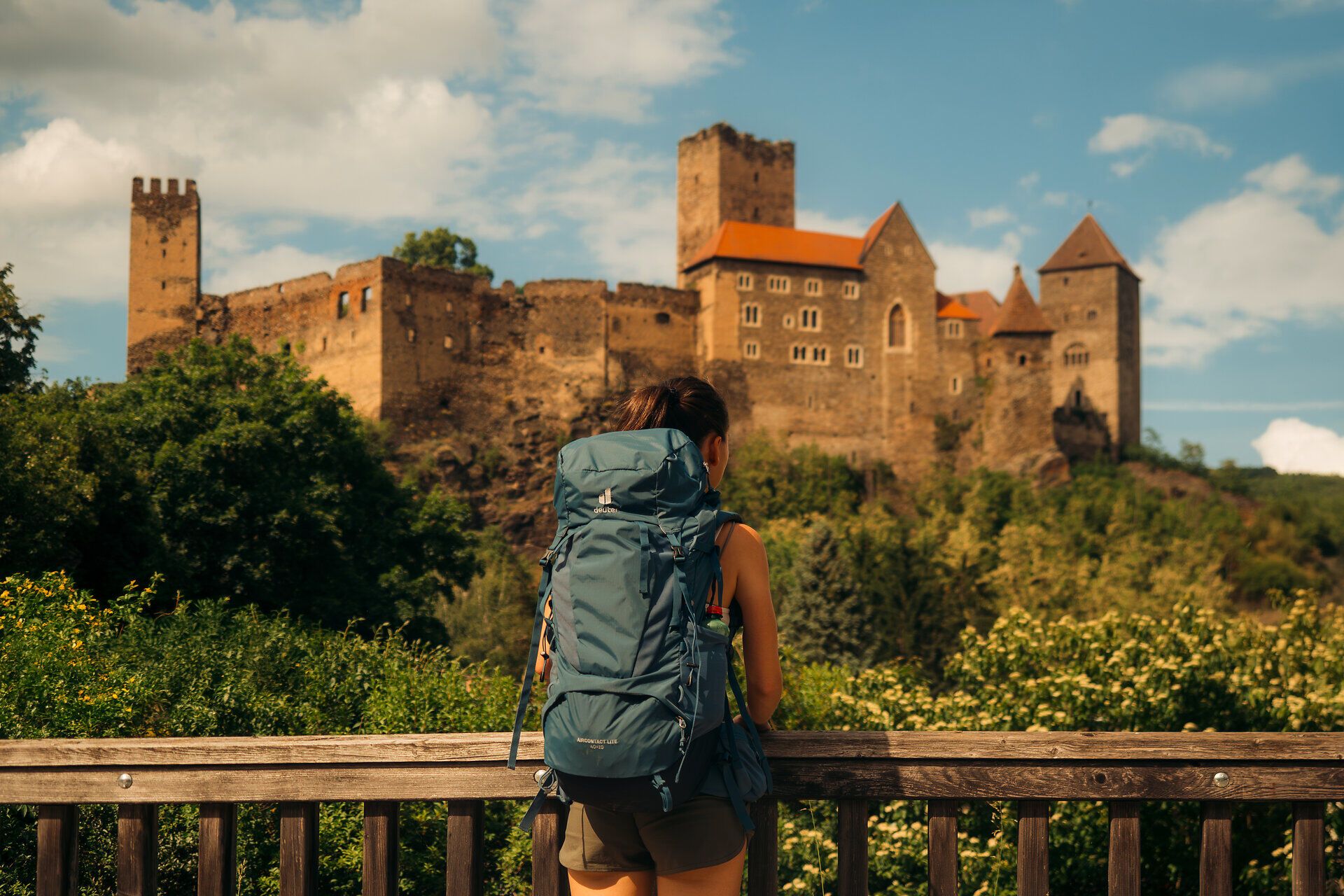 Hiker looking towards the picturesque Hardegg Castle