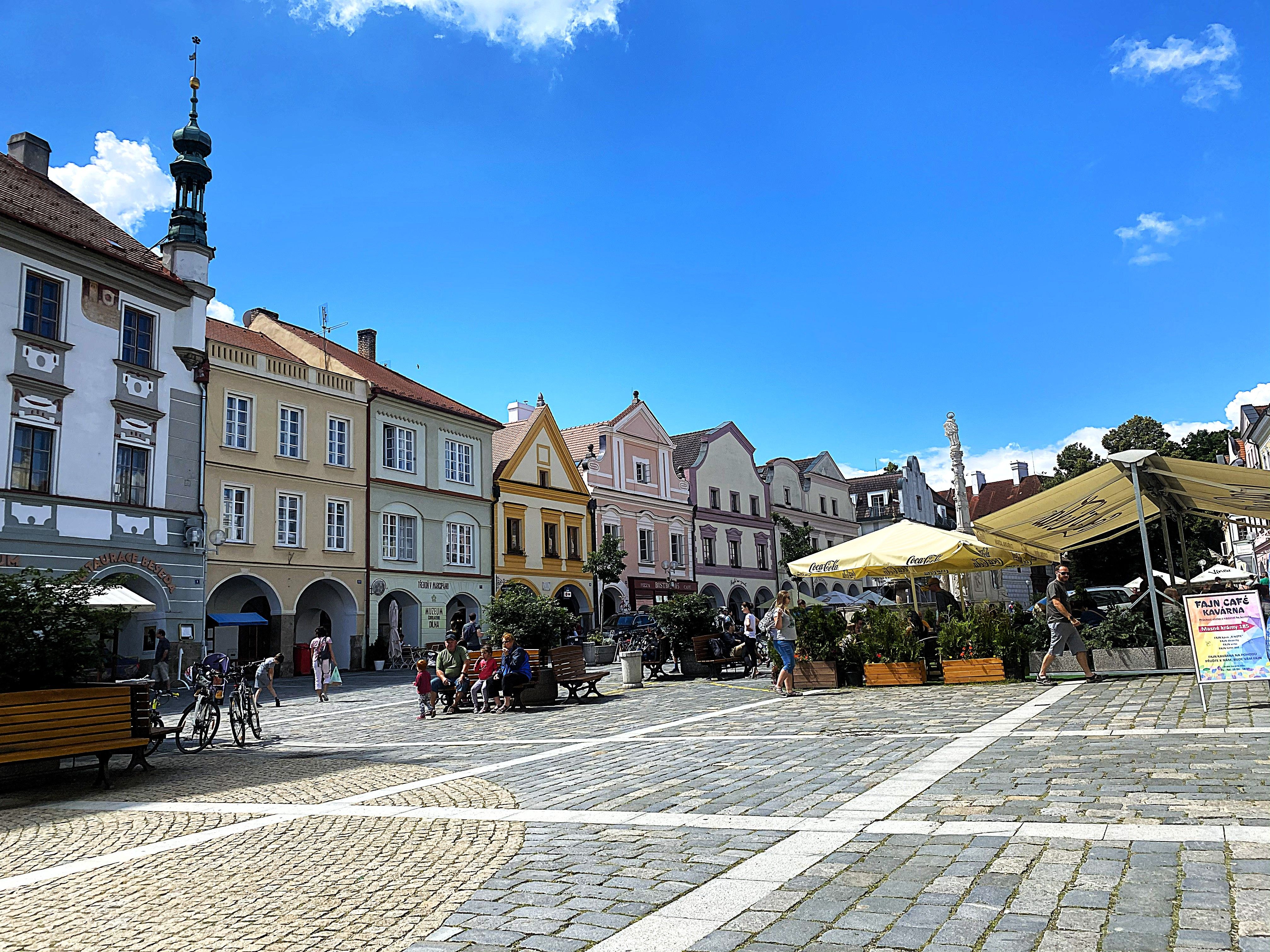 Lively town square with a colorful row of houses