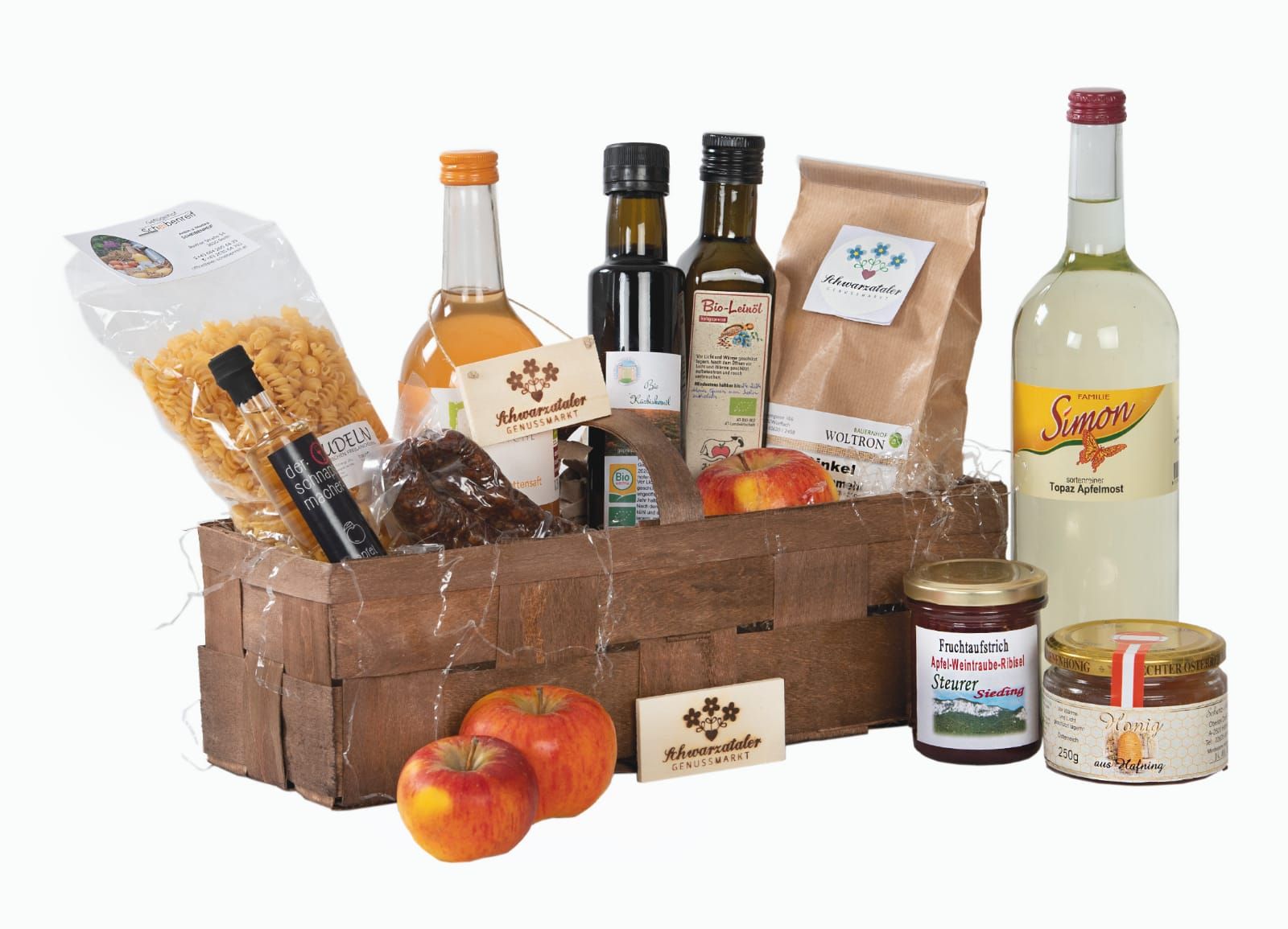A gift basket with regional products such as oil, pasta, juice and honey.