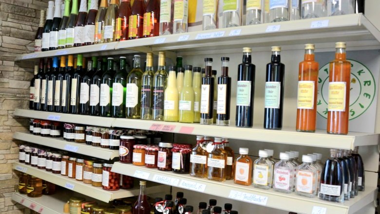 Shelves with bottles and jars in a store.