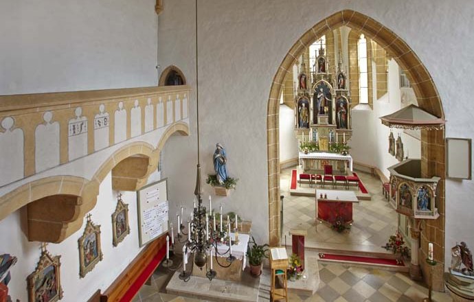 Interior view of the Edlitz fortified church with altar and pulpit.