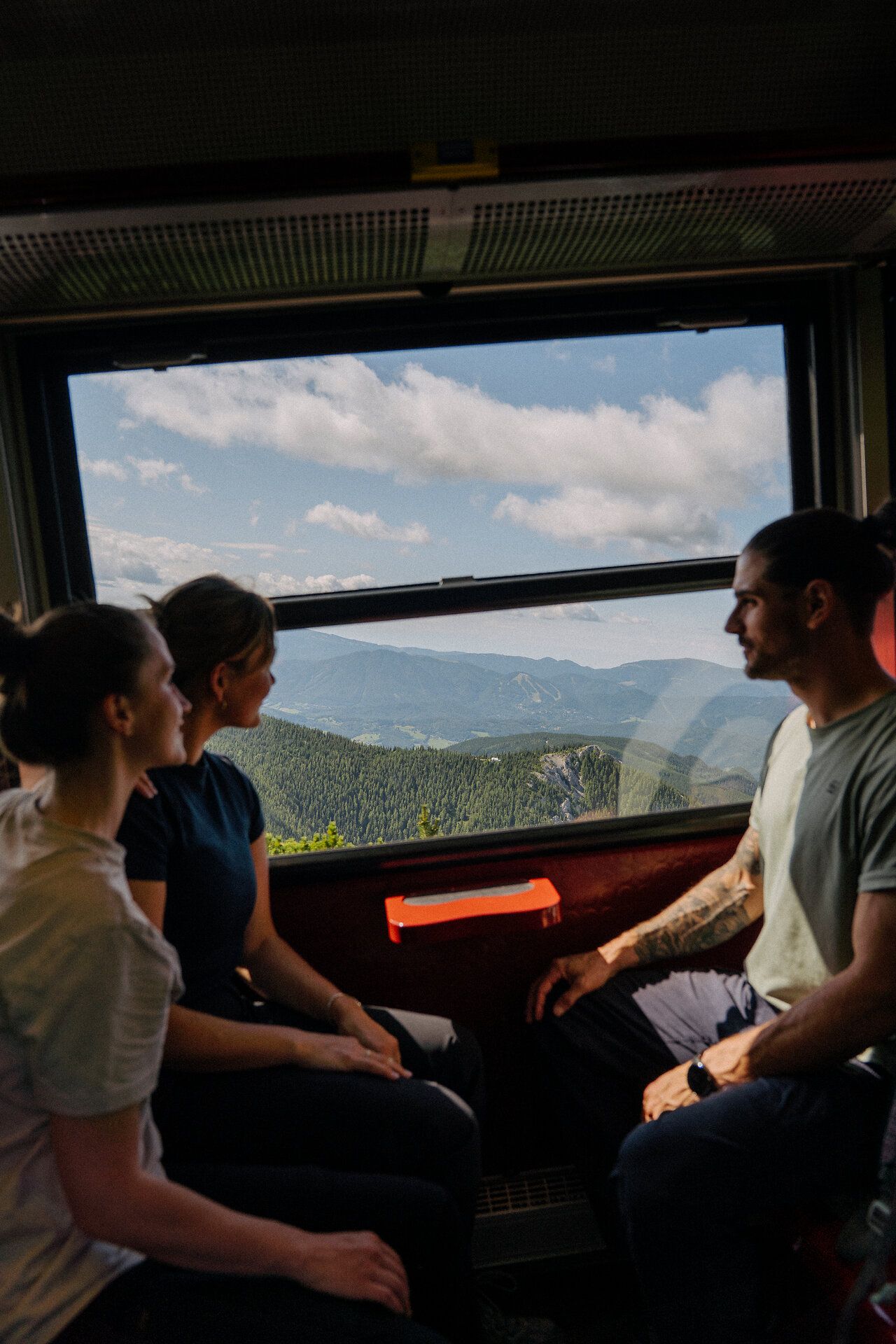 Close-up of a screw coupling between two railroad cars.