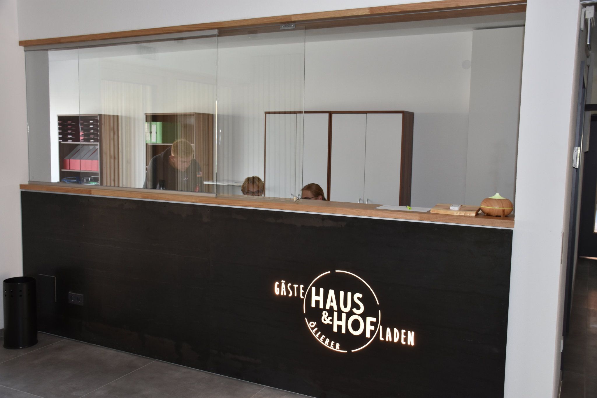 Reception with illuminated logo.