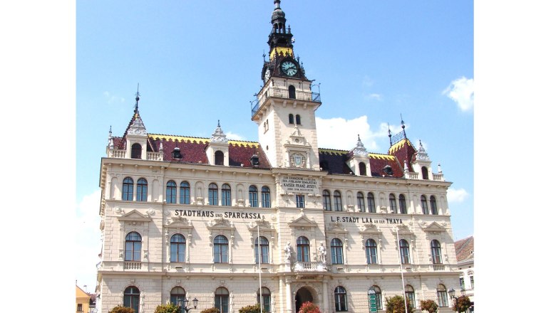 Historic town hall of Laa an der Thaya with clock tower and ornate facades.