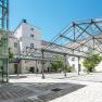 Inner courtyard of the Hotel Altes Kloster with glass roof and modern design.