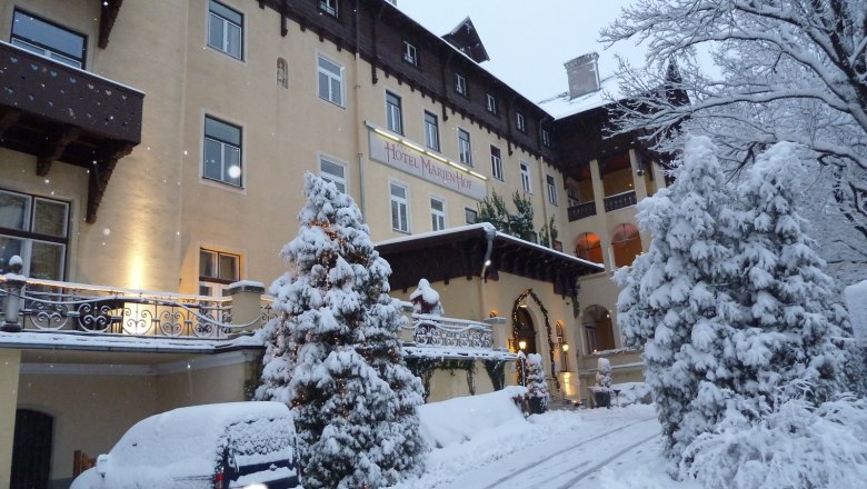 Wintery Hotel Marienhof covered in snow.
