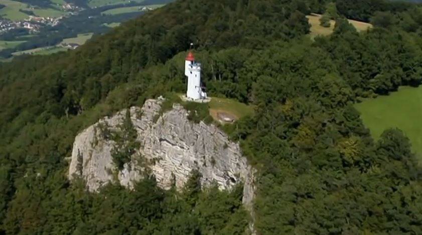 Aerial view of the Urlingerwarte on a wooded hill.