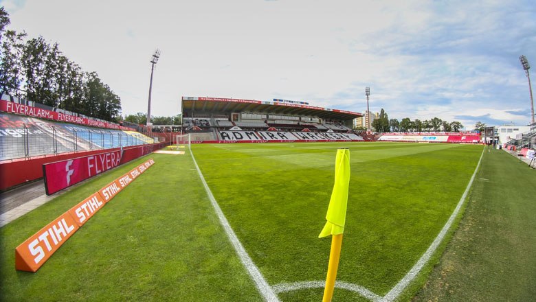 Soccer stadium of FC Flyeralarm Admira with empty stands and pitch.