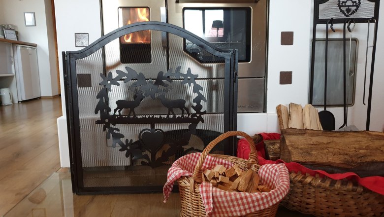 Wood stove living room, © Gebhard Auer