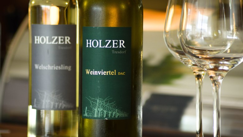 Wine bottles with wine glasses