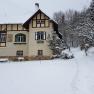 Snow-covered Villa Waldheimat on the Semmering in winter.