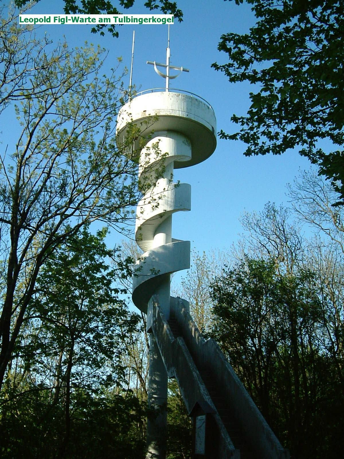 Leopold Figl-Warte on the Tulbingerkogel, a white observation tower with a spiral staircase, surrounded by trees.