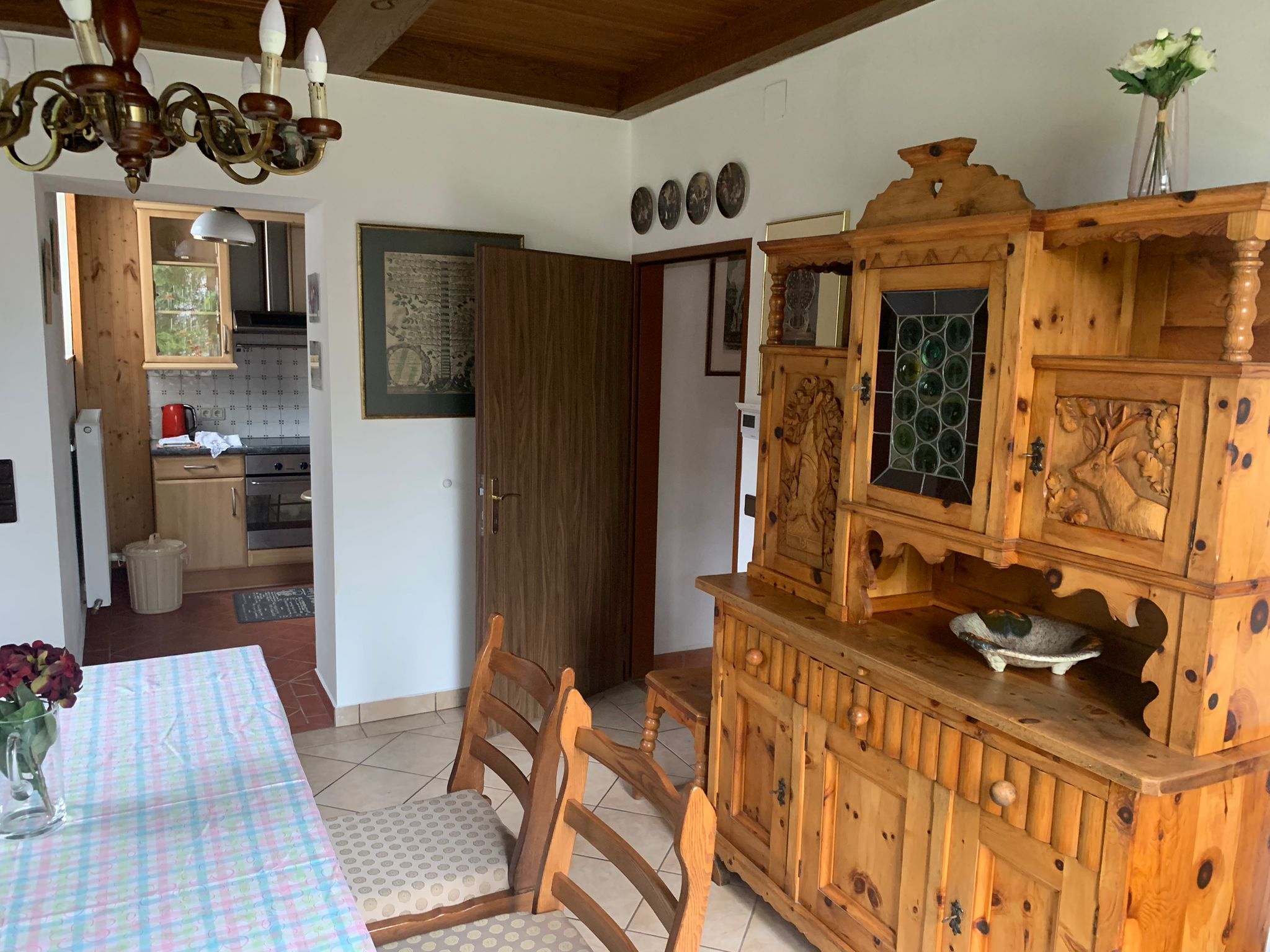 Rustic interior with wooden furniture and dining table.