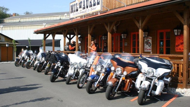 Motorcycles in front of the Saloon Milwaukee Restaurant and Bar.